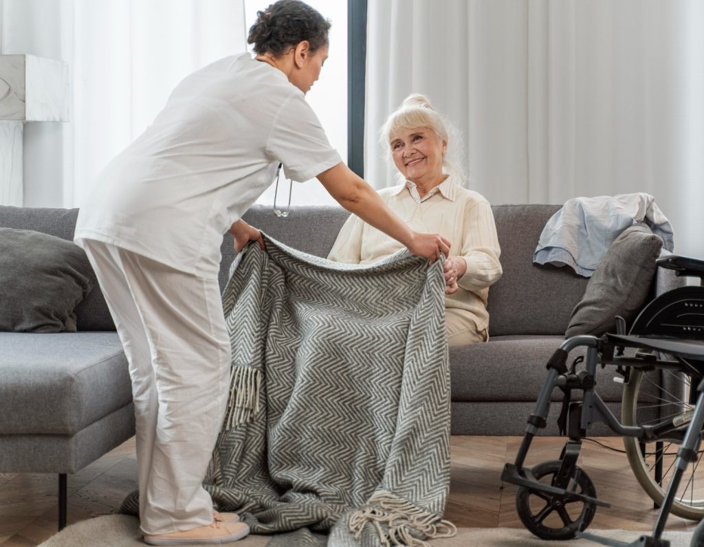 maid taking care of an elderly woman